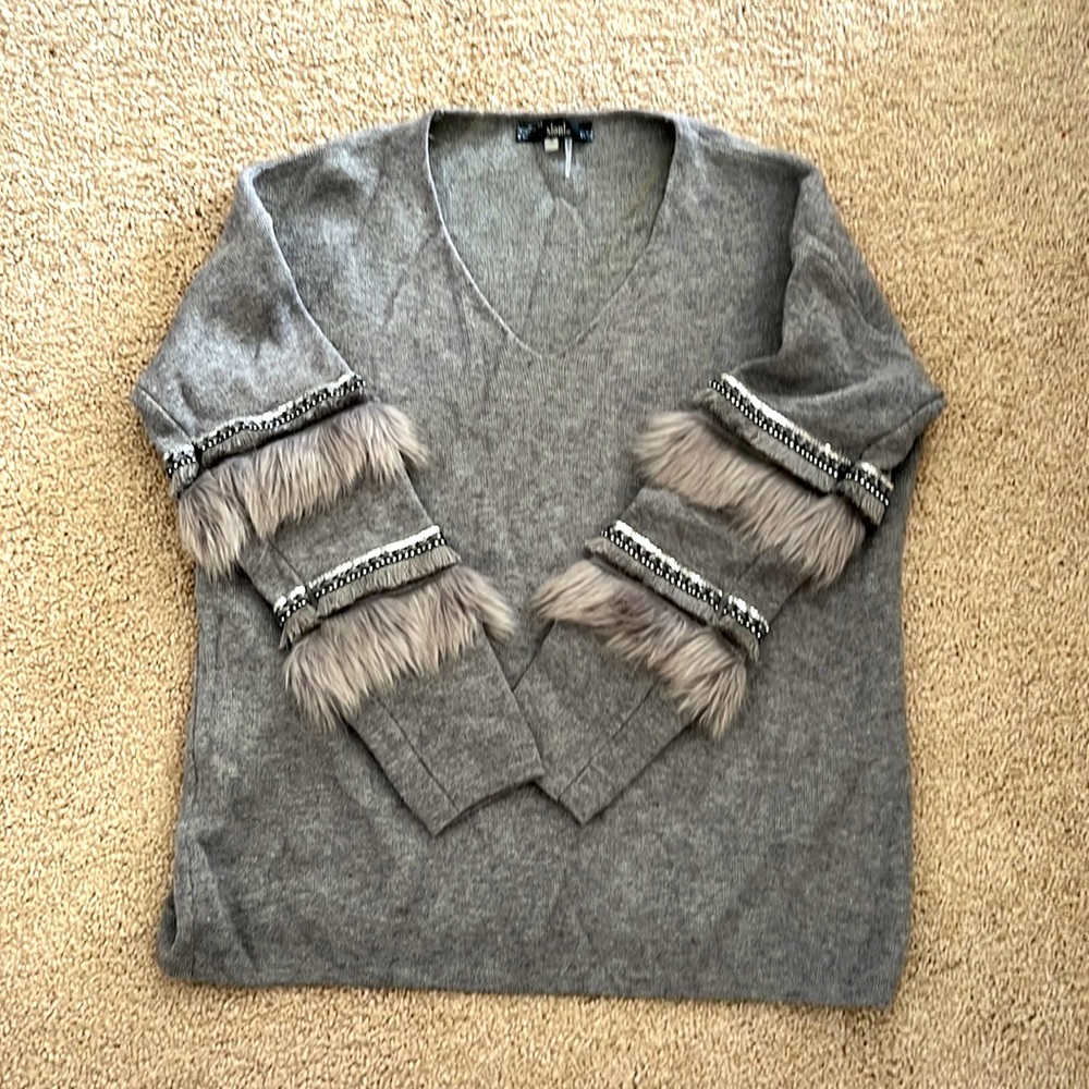 Embellished sleeve gray sweater.